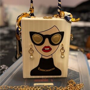 Chic Designer Box Bag with Graphic Face Design